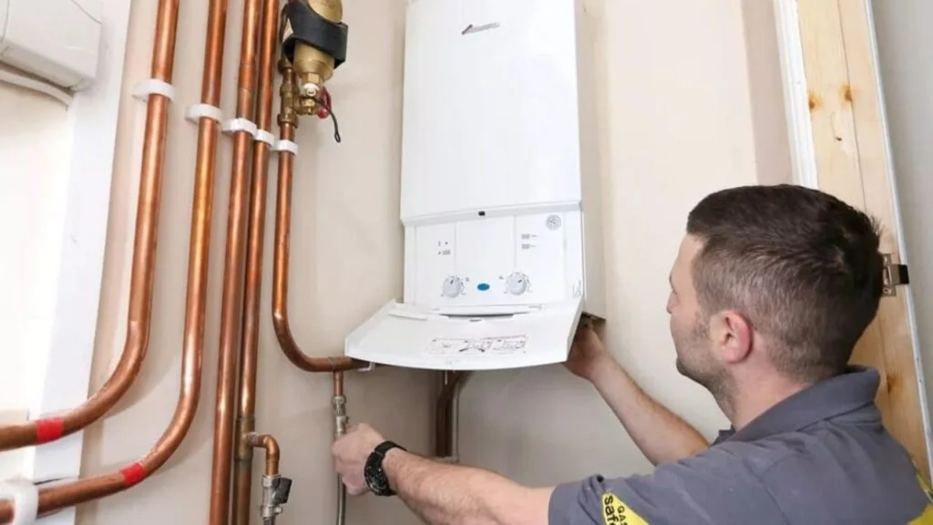 Denver boiler installation technician at work